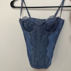 Urban Outfitters: Blue corset top with lace details #corsettop #urbanoutfitters
